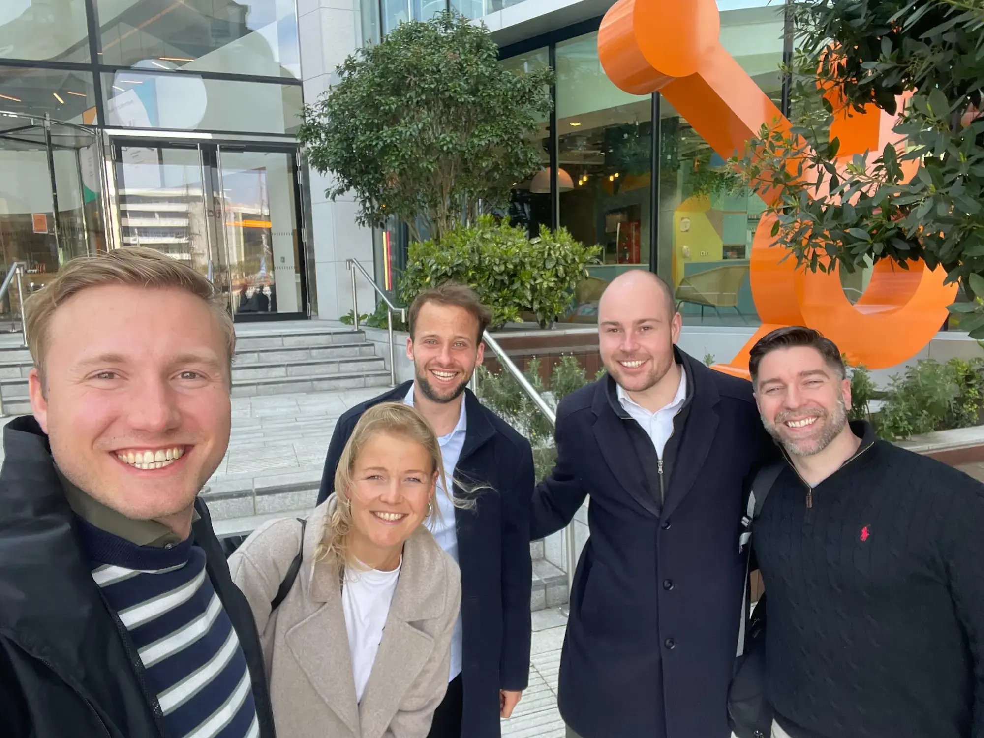 Bas in front of HubSpot logo