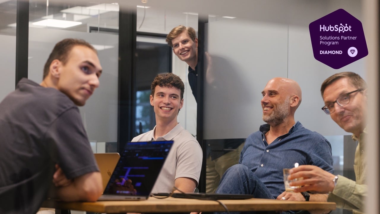 Team foto met HubSpot Diamond logo